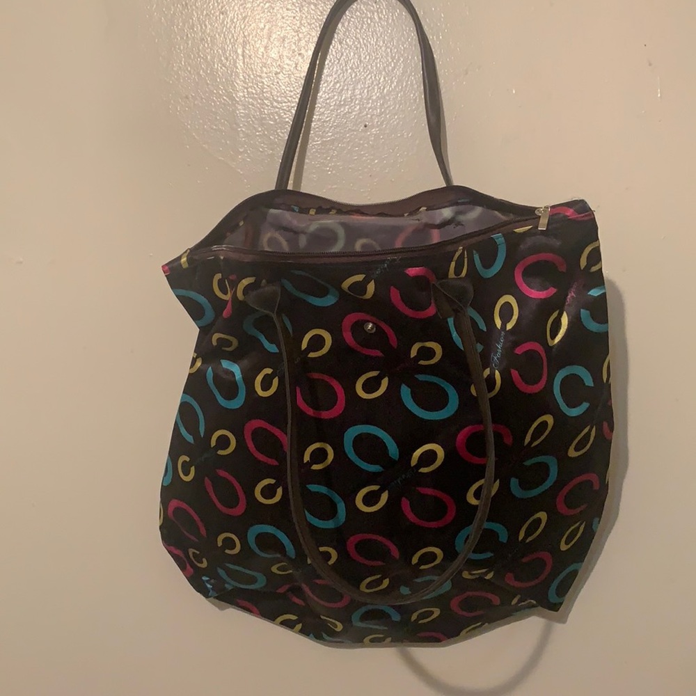 Purse, no clue what brand, it says fashion on it.